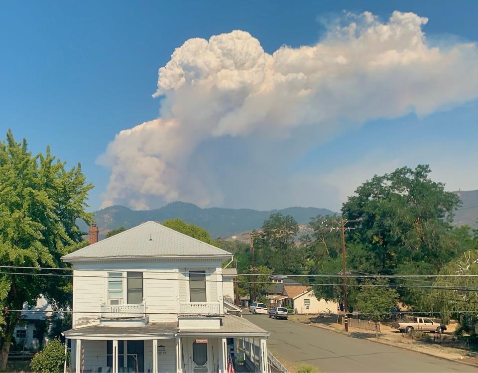 The plume from the McKinney Fire as shown from Third Street in downtown Yreka on Saturday morning, July 30, 2022, The blaze was burning about a dozen miles west of the Siskiyou County city.