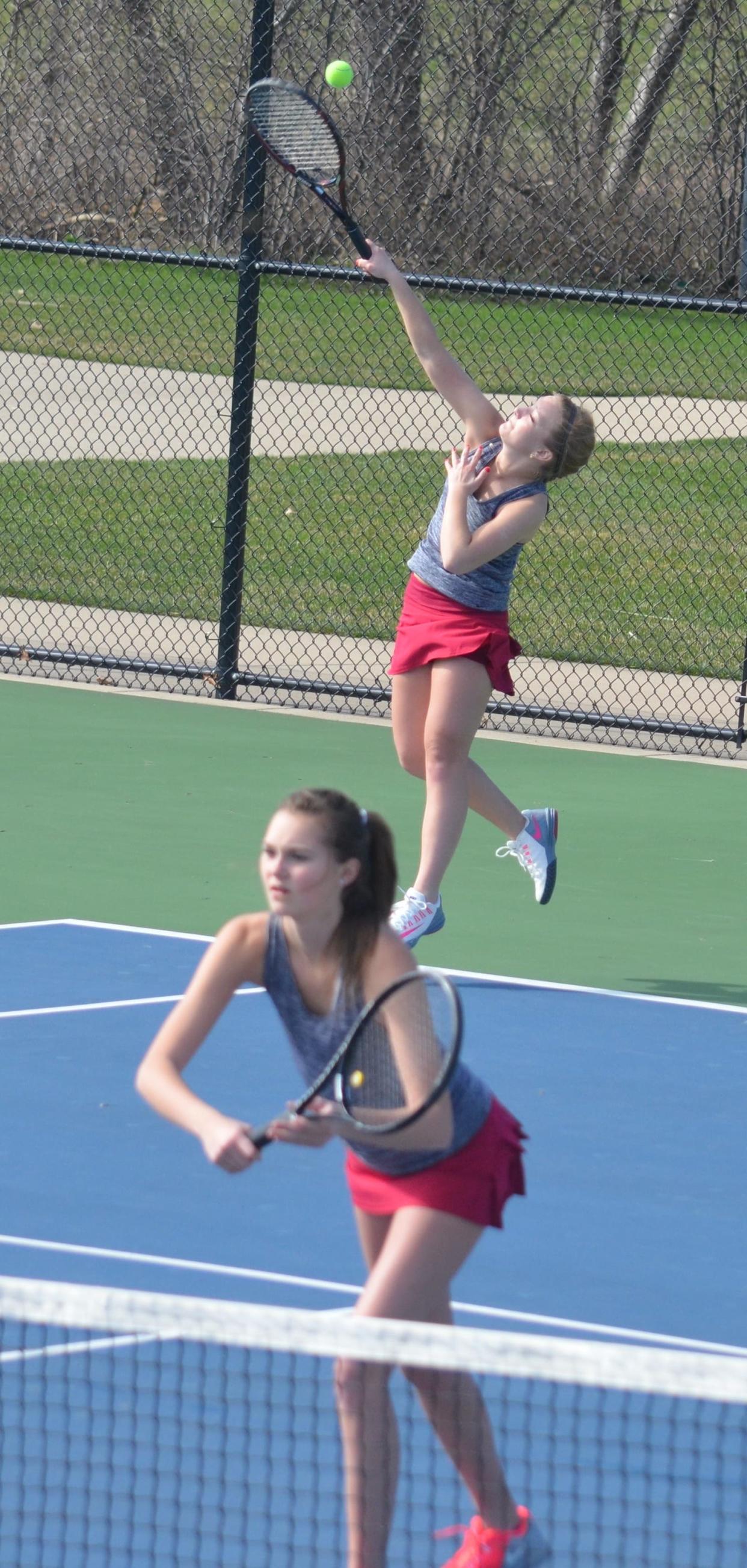 Holland Christian's Lauren Balder, top, and Mackenzie Weener led the Maroons past Hamilton on Monday. [Sentinel file]