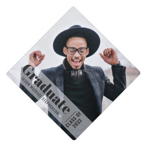 <p><a href="https://go.redirectingat.com?id=74968X1596630&url=https%3A%2F%2Fwww.zazzle.com%2Fmodern_photo_overlay_simple_graduation_cap_topper-256579680340075440&sref=https%3A%2F%2Fwww.thepioneerwoman.com%2Fhome-lifestyle%2Fcrafts-diy%2Fg39693817%2Fgraduation-cap-ideas%2F" rel="nofollow noopener" target="_blank" data-ylk="slk:Shop Now;elm:context_link;itc:0;sec:content-canvas" class="link rapid-noclick-resp">Shop Now</a></p><p>Modern Photo Overlay Graduation Cap</p><p>zazzle.com</p><p>$16.35</p><span class="copyright">Zazzle</span>