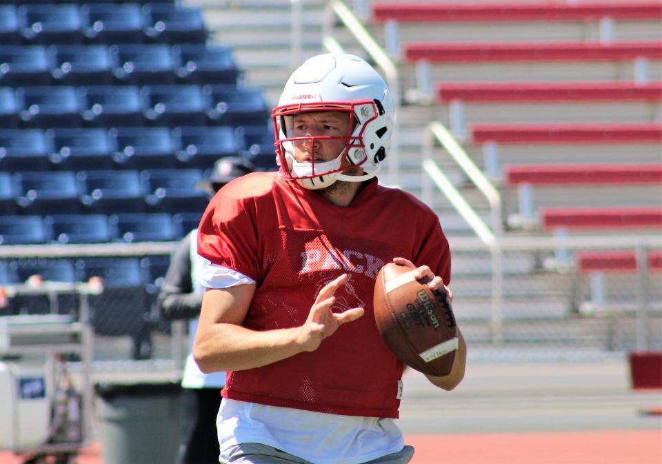 CSU-Pueblo quarterback Steven Croell drops back to pass in a drill during the Thunderwolves practice at CSU-Pueblo.
