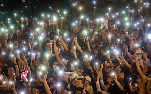 Many thousands of protesters met for a peaceful mass rally on Monday to ask for US help in the crisis - Credit: Vivek Prakash/REX