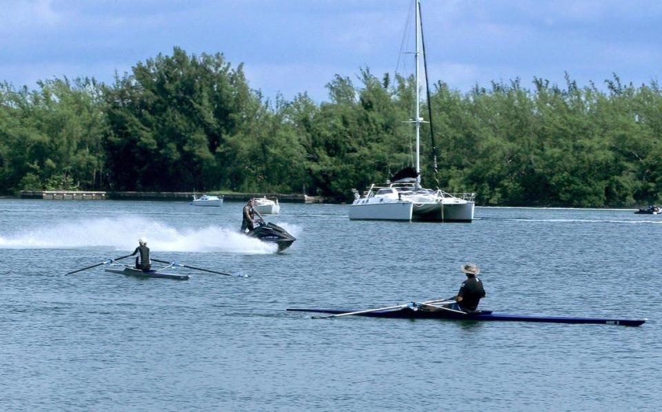 Rowers Sue and Ron Kern, like other rowers and paddlers in the Miami Marine Stadium basin, worry about getting swamped or plowed over by water bikers. A huge increase in water bike and powerboat traffic has created a chaotic and dangerous situation at the lagoon.