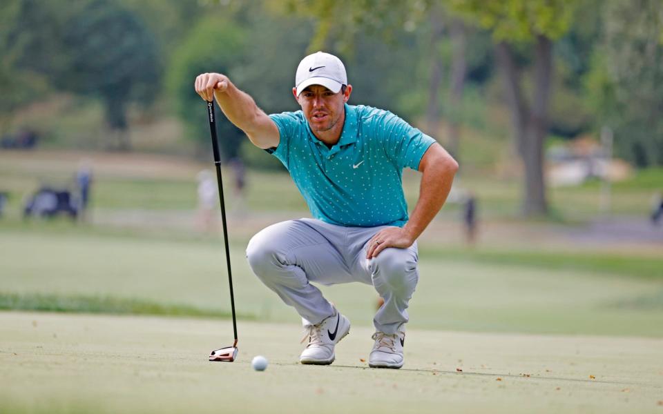 Rory McIlroy lines up a putt on the 11th hole during the final round of the BMW Championship - USA Today