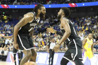 Brooklyn Nets' DeAndre Jordan, left, David Nwaba celebrate beating the Los Angeles Lakers in a preseason NBA game in Shanghai, China, Thursday, Oct. 10, 2019. (AP Photo) (AP Photo)