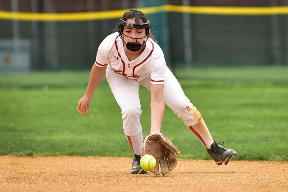 Gaby Linde, #1,2B of Tenafly Tigers fields a grounder between the innings she plays against Holy Angels during their softball game at Tenafly High, Monday on 04/25/22.