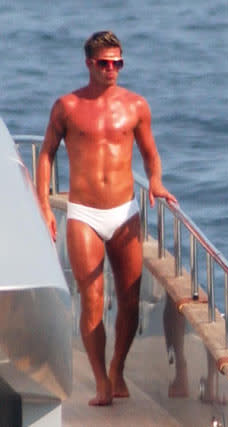 OK. Fine, David Beckham! You actually look good in a Speedo. (shaking fist in air)