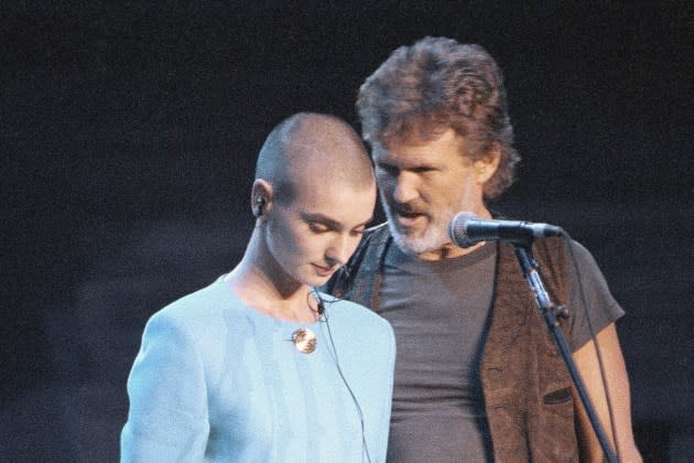 Kris Kristofferson comforted Sinead O'Connor at the 1992 Bob Dylan tribute concert, after O'Connor was booed by the crowd. - Credit: Ron Frehm/AP