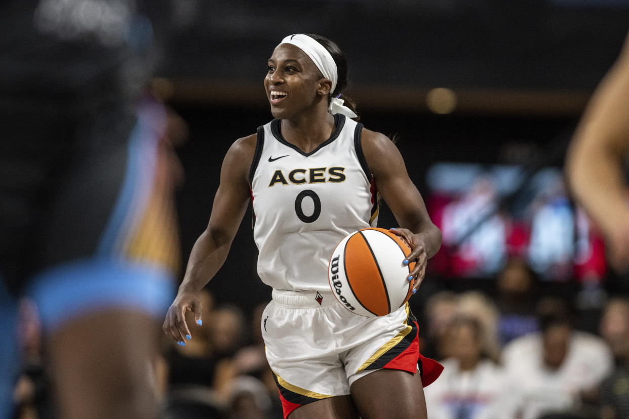 Las Vegas Aces guard Jackie Young moves the ball during a game against the Atlanta Dream on June 2, 2023. (AP Photo/Danny Karnik)