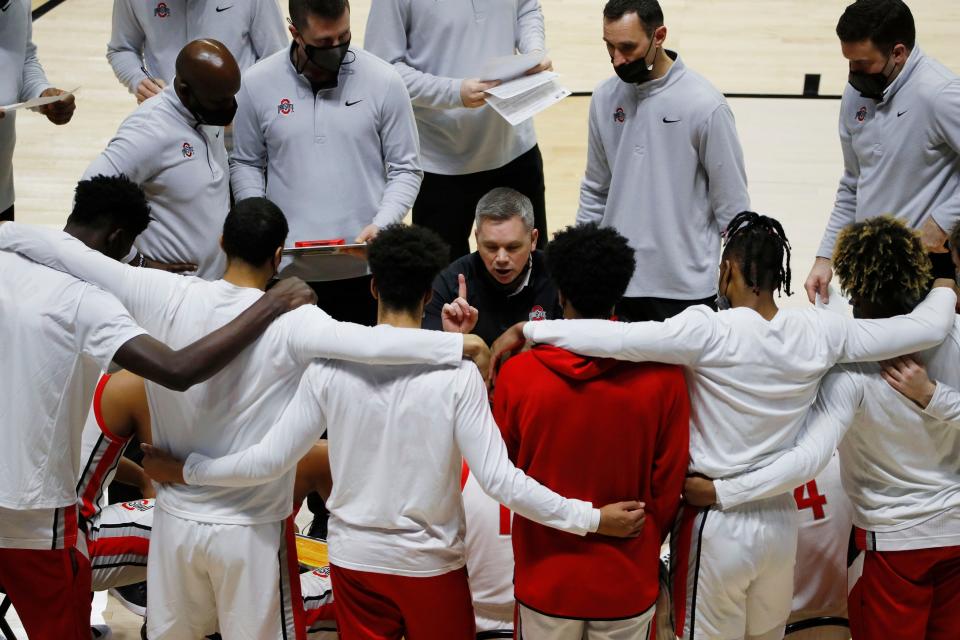 Ohio State coach Chris Holtmann talks to his players during a timeout against Oral Roberts in the first round of the 2021 NCAA Tournament on March 19.