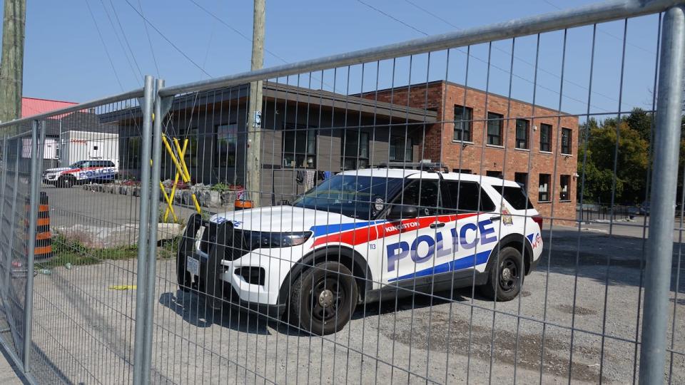 Kingston police vehicle near encampment Sept. 13, 2024