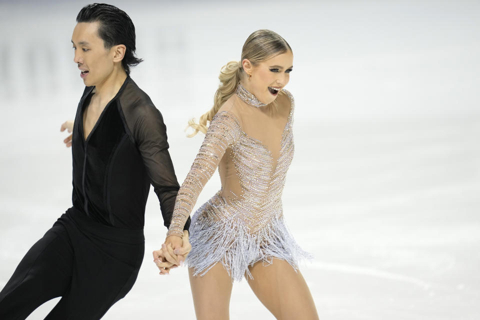 Holly Harris and Jason Chan of Australia perform in the ice dance rhythm dance program at the Four Continents Figure Skating Championships Friday, Feb. 10, 2023, in Colorado Springs, Colo. (AP Photo/David Zalubowski)