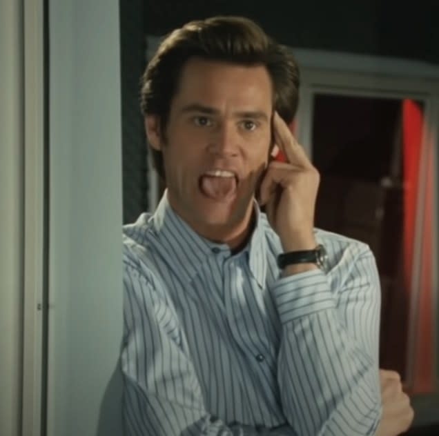 Jim Carrey as Bruce making silly faces