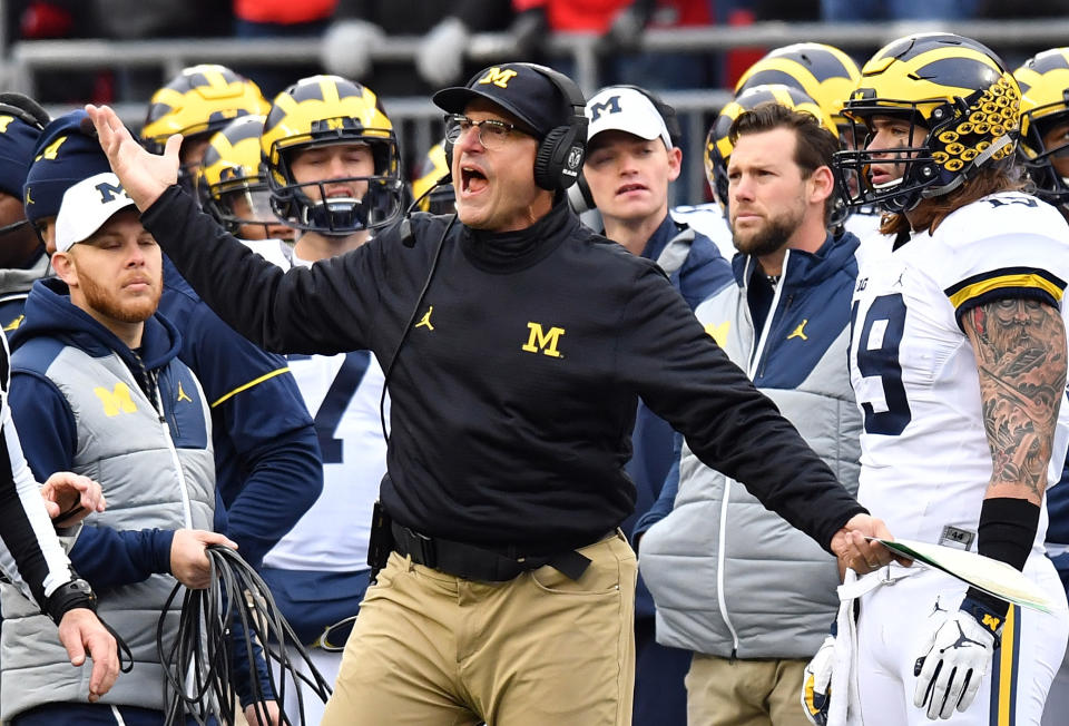 COLUMBUS, OH - NOVEMBER 26:   Head coach Jim Harbaugh of the Michigan Wolverines argues a call on the sideline during the second half against the Ohio State Buckeyes at Ohio Stadium on November 26, 2016 in Columbus, Ohio.  (Photo by Jamie Sabau/Getty Images)