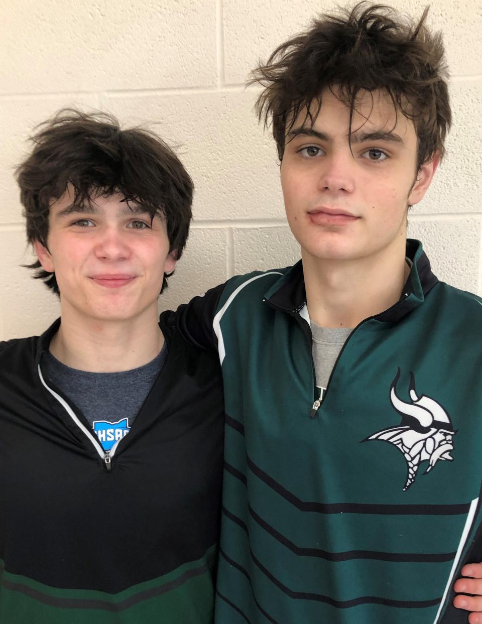 Northridge senior MIchael Fister (left), third at 138 pounds, and sophomore Trevon Angus, fourth at 132, both qualified for the Division III state wrestling tourney Saturday during district competition at Harrison Central High School.