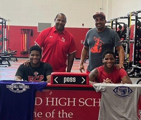 Billois, left, and Bill Sousa with coaches Marc Hayes, left, and Mark DeBrito.