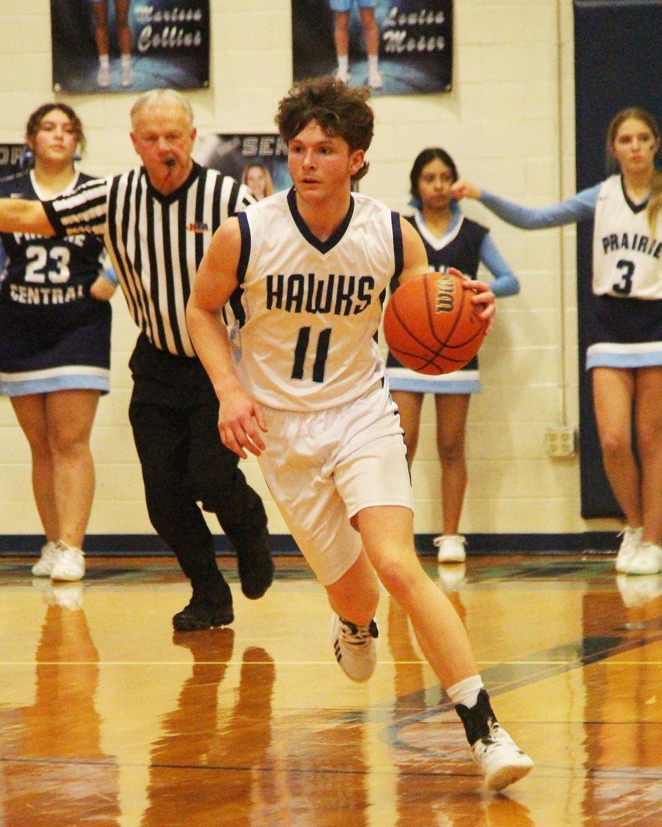 Levi Goad brings the ball up the floor for Prairie Central. Goad made his return to the Hawks lineup after missing four weeks with a wrist injury.