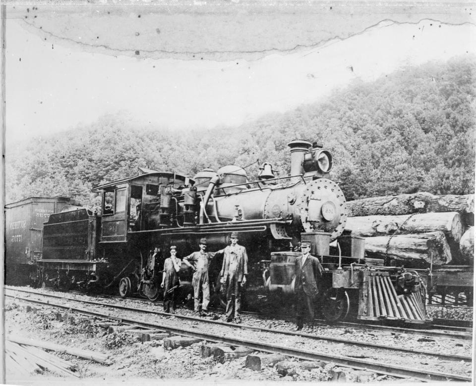 The Little River Railroad Company Locomotive No. 148 stands ready in Elkmont, Tennessee, sometime prior to 1918. Remnants of train tracks are still visible in the area today.