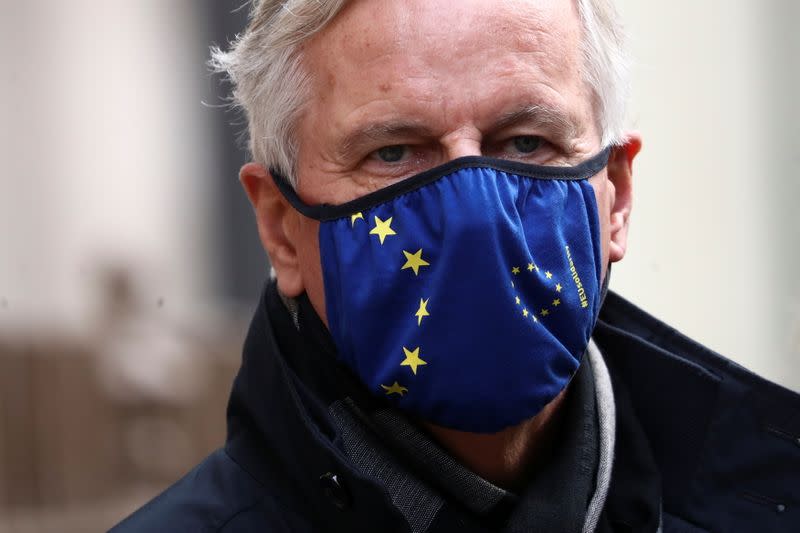 European Union's Brexit negotiator Michel Barnier walks at Westminster in London