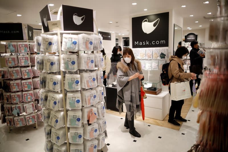 Shoppers are seen at the face mask speciality shop Mask.com, amid the coronavirus disease (COVID-19) outbreak, in Tokyo