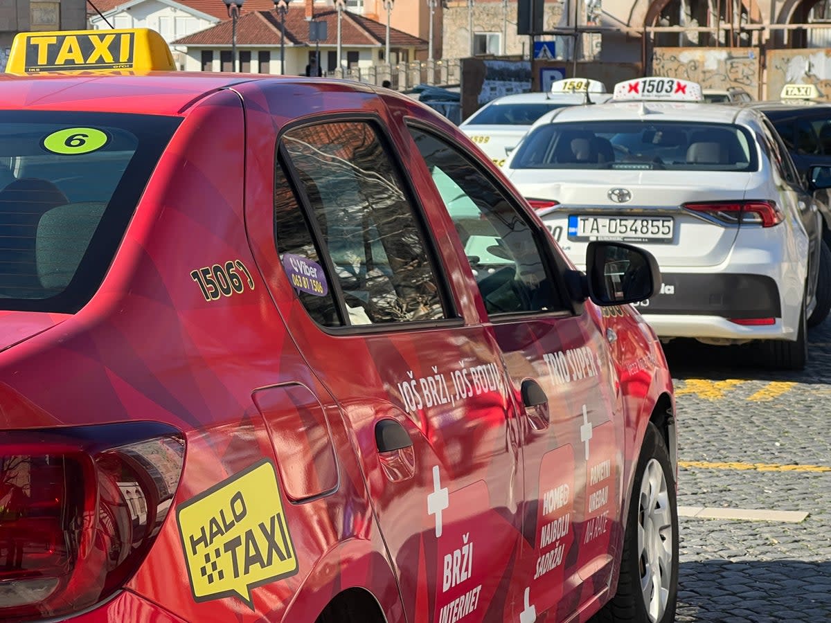 Fares fair? Taxis in Bosnia, some distance from Sarajevo airport  (Simon Calder)