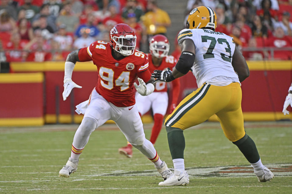 Kansas City Chiefs defensive end Malik Herring (94) rushes against Green Bay Packers offensive tackle Yosh Nijman (73)during an NFL pre-season football game Thursday, Aug. 25, 2022, in Kansas City, Mo. (AP Photo/Peter Aiken)