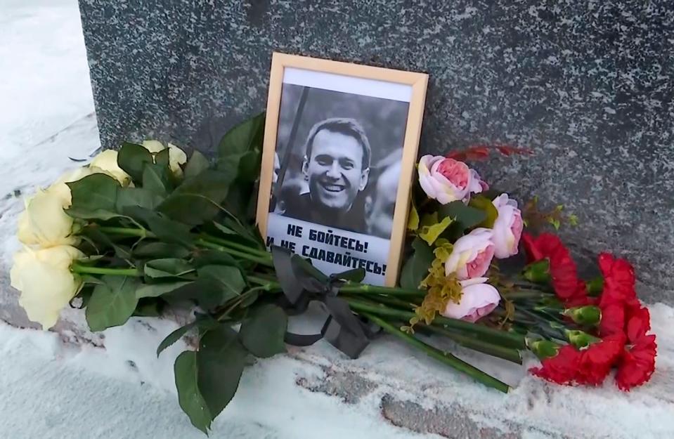 Tens of thousands have written to demand Navalny’s body is returned to his family (AP)