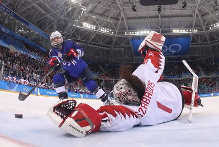 Ice Hockey - Pyeongchang 2018 Winter Olympics - Women Final Match - Gangneung Hockey Centre, Gangneung, South Korea, February 22, 2018 - Jocelyne Lamoureux-Davidson of the U.S. scores the game winning goal against goalkeeper Shannon Szabados of Canada during a penalty shootout. REUTERS/Bruce Bennett/Pool