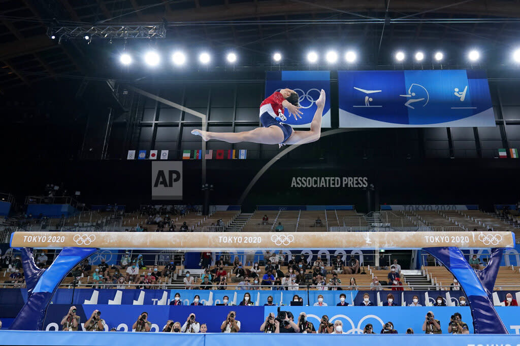 Lee performs on the balance beam during the artistic gymnastics women's final at the 2020 Summer Olympics on July 27, 2021, in Tokyo. (Ashley Landis / AP)