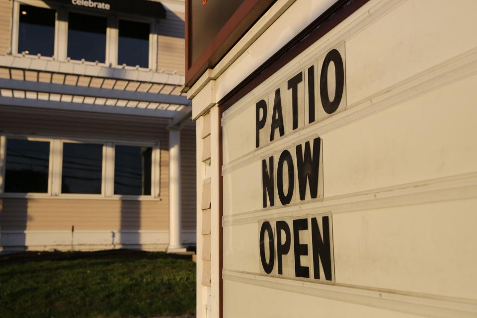 A sign at 3 Restaurant in Franklin alerts diners that the patio is open, Sept. 29, 2022.