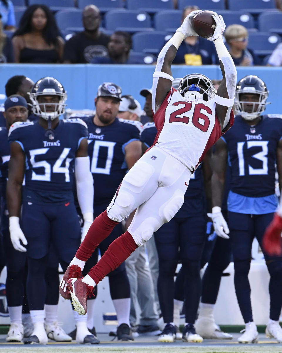 Arizona Cardinals running back Eno Benjamin (26) catches a pass against the Tennessee Titans in the first half of a preseason NFL football game Saturday, Aug. 27, 2022, in Nashville, Tenn. (AP Photo/Mark Zaleski)