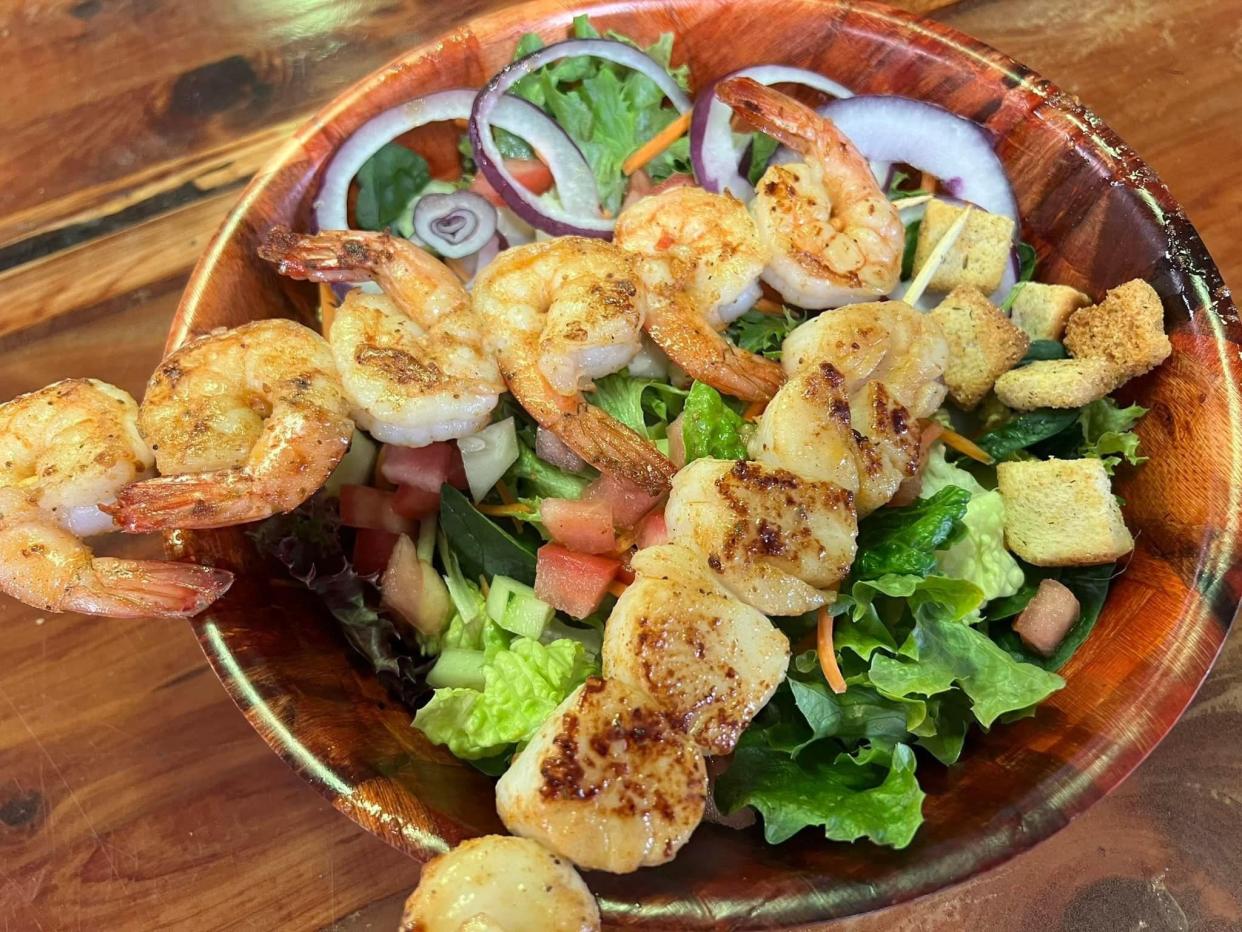 Salad with added shrimp from Macker Seafood in Daytona Beach.