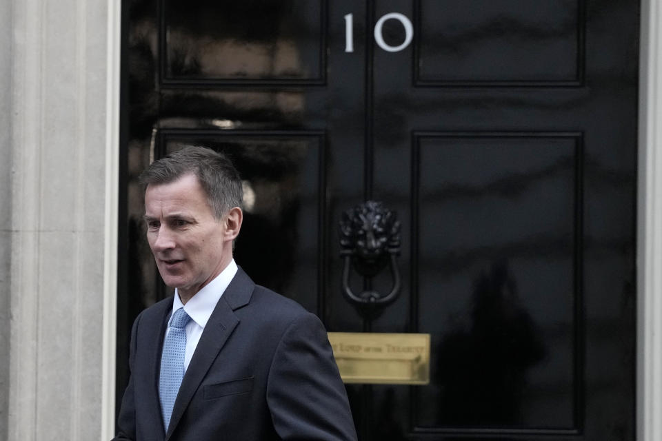 FTSE FILE - Britain's Chancellor of the Exchequer Jeremy Hunt leaves 10 Downing Street in London, Jan. 18, 2023. Britain's Treasury chief said he would be prepared to see the U.K. economy slip back into recession if further interest rate hikes are necessary to bring down inflation. (AP Photo/ Frank Augstein, File)