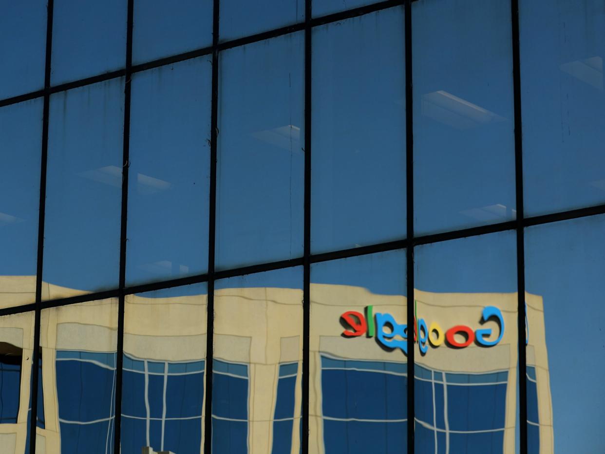The Google logo is shown reflected on an adjacent office building in Irvine, California, U.S. August 7, 2017: REUTERS/Mike Blake