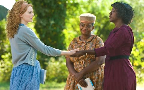 Emma Stone, Octavia Spencer and Davis in The Help (2011) - Credit: AP
