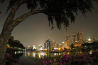 <p>An image made with an extreme wide-angle lens shows a general view of Bangkok as seen from Benjakiti Park, Thailand, April 29, 2016. An extreme heat wave is affecting parts of Thailand, health officials said. The dry season in Thailand usually begins in November and the heat typically tapers off in May, when monsoon rains are expected. <i>(Sara Houlison/EPA)</i></p>