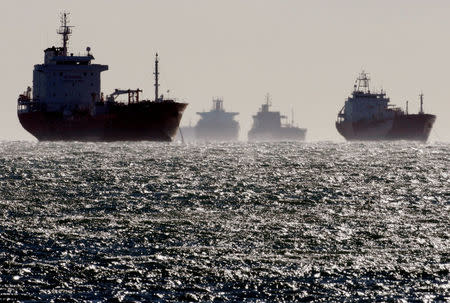 FILE PHOTO - Oil and gas tankers sit anchored off the Fos-Lavera oil hub near Marseille, southeastern France, December 12, 2008. REUTERS/Jean-Paul Pelissier/File Photo