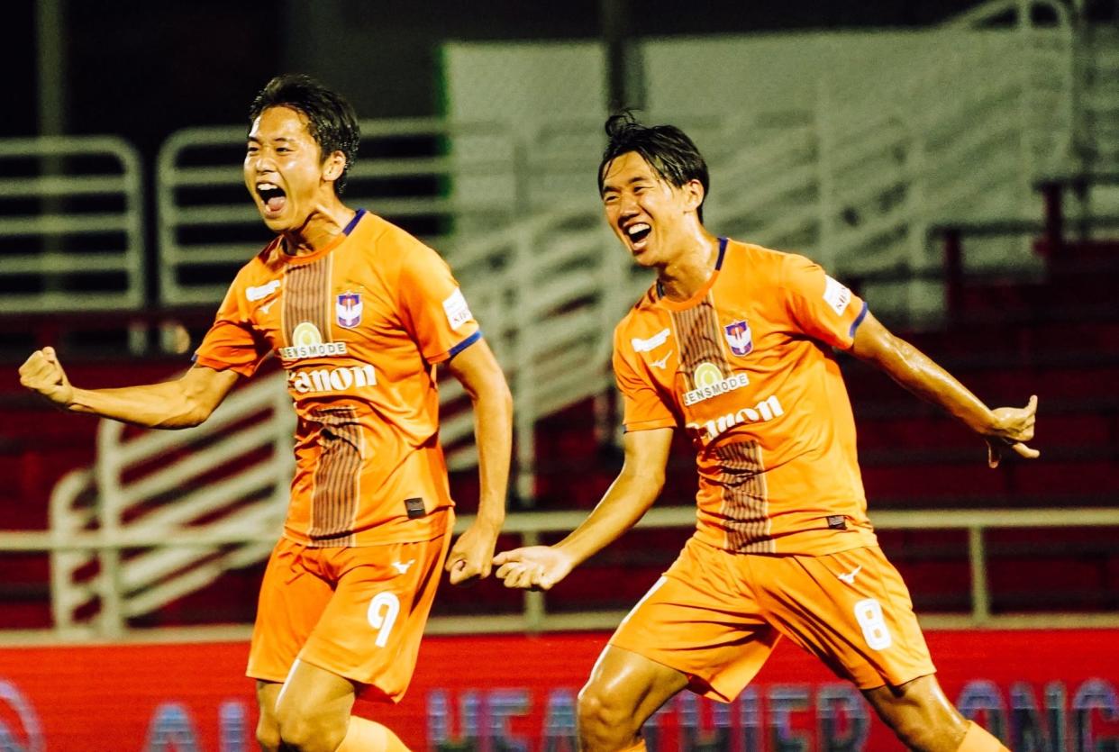 Albirex Niigata forward Kiyoshiro Tsuboi (left) celebrates scoring against Hougang United. (PHOTO: Singapore Premier League/Facebook)