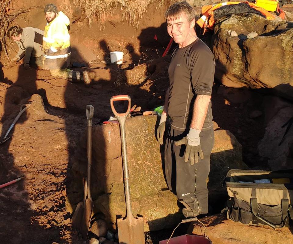 Stuart Cook (center) and other archaeologists near the Wemyss Caves.