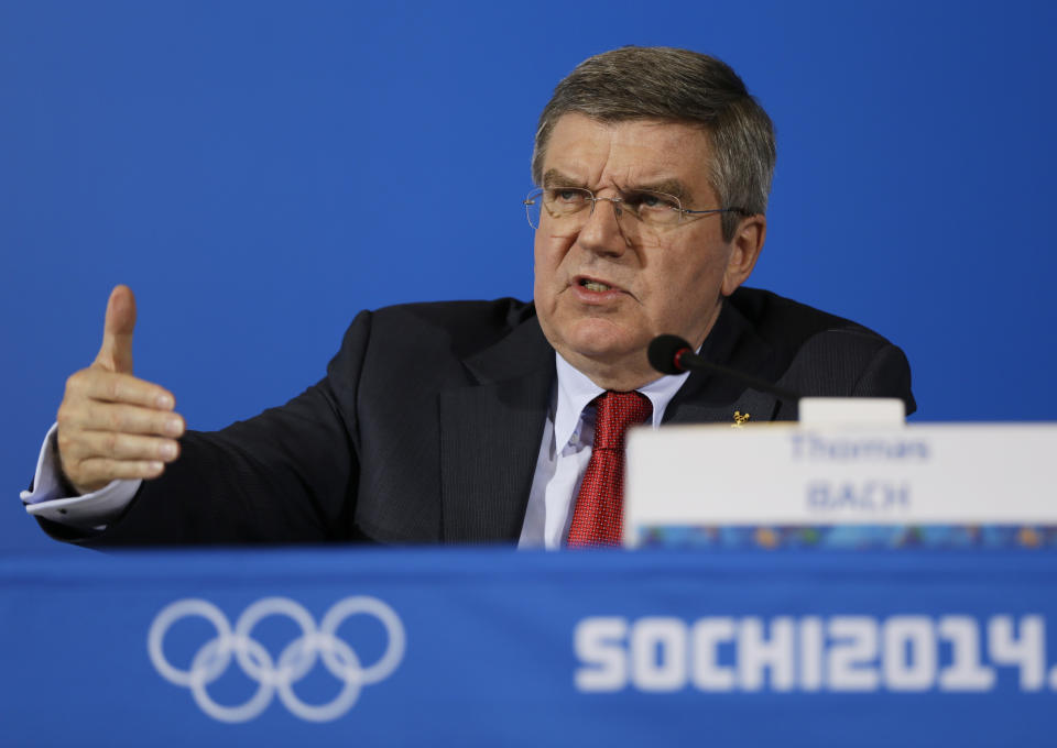 International Olympic Committee President Thomas Bach answers a question during a news conference at the 2014 Winter Olympics, Sunday, Feb. 23, 2014, in Sochi, Russia. (AP Photo/Morry Gash)