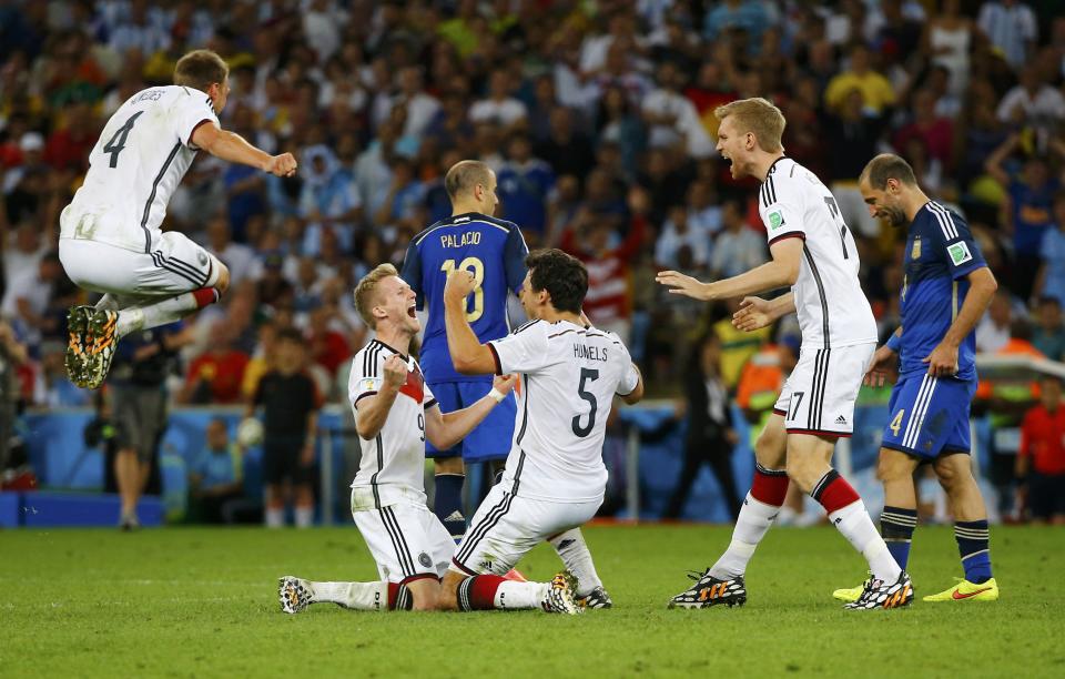 Germany players celebrate after winning the 2014 World Cup final between Germany and Argentina at the Maracana stadium