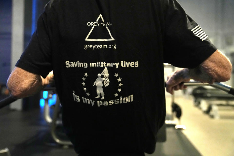 U.S. Army veteran Ed Reichbach, 93, works out at the Grey Team veterans center, Wednesday, May 17, 2023, in Boca Raton, Fla. The center is helping veterans with post-traumatic stress disorder and other mental and physical ailments get back into the civilian world. (AP Photo/Lynne Sladky)