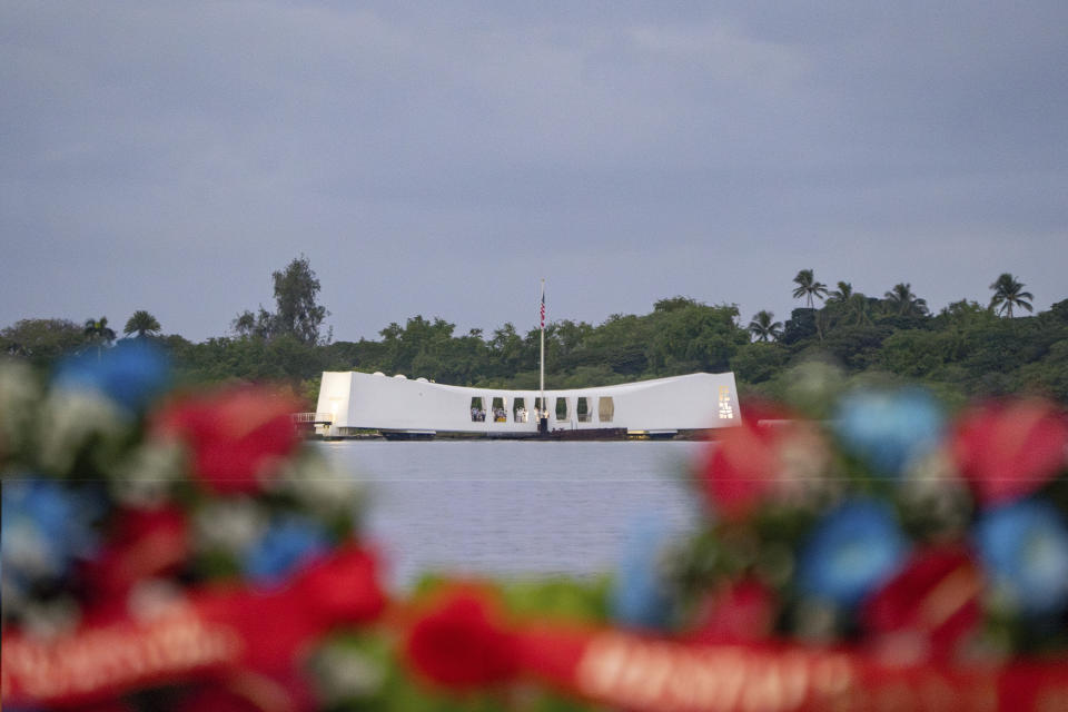 The USS Arizona Memorial is seen during a ceremony to mark the 82nd anniversary of the Japanese attack on Pearl Harbor, Thursday, Dec. 7, 2023, in Honolulu County, Hawaii. Pearl Harbor Survivors, World War II veterans and their families gather in Pearl Harbor to commemorate those who perished 82 years ago. (AP Photo/Mengshin Lin)