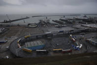 Lorries drive away after disembarking from a ferry on the morning after Brexit took place at the Port of Dover in Dover, England, Saturday, Feb. 1, 2020. If you thought the drawn-out battle over the U.K.'s departure from the European Union was painful, wait until you see what comes next. While Britain formally left the EU at 11 p.m. local time Friday, the hard work of building a new economic relationship between the bloc and its ex-member has just begun. (AP Photo/Matt Dunham)