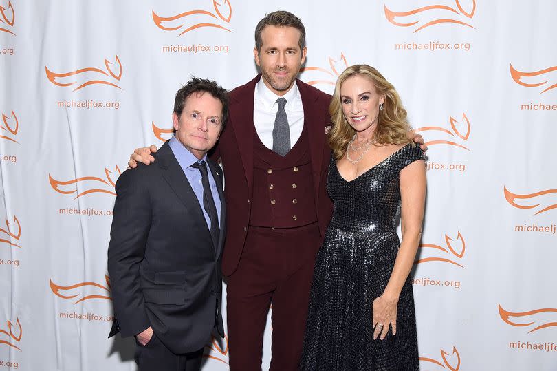 Michael J. Fox (left) and Ryan Reynolds (centre) with Tracy Pollan pictured in 2019 -Credit:Getty