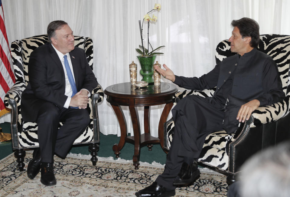 Secretary of State Mike Pompeo, left, meets with Pakistani Prime Minister Imran Khan, right, at the Residence of the Pakistani Ambassador in Washington, Tuesday, July 23, 2019. (AP Photo/Pablo Martinez Monsivais)