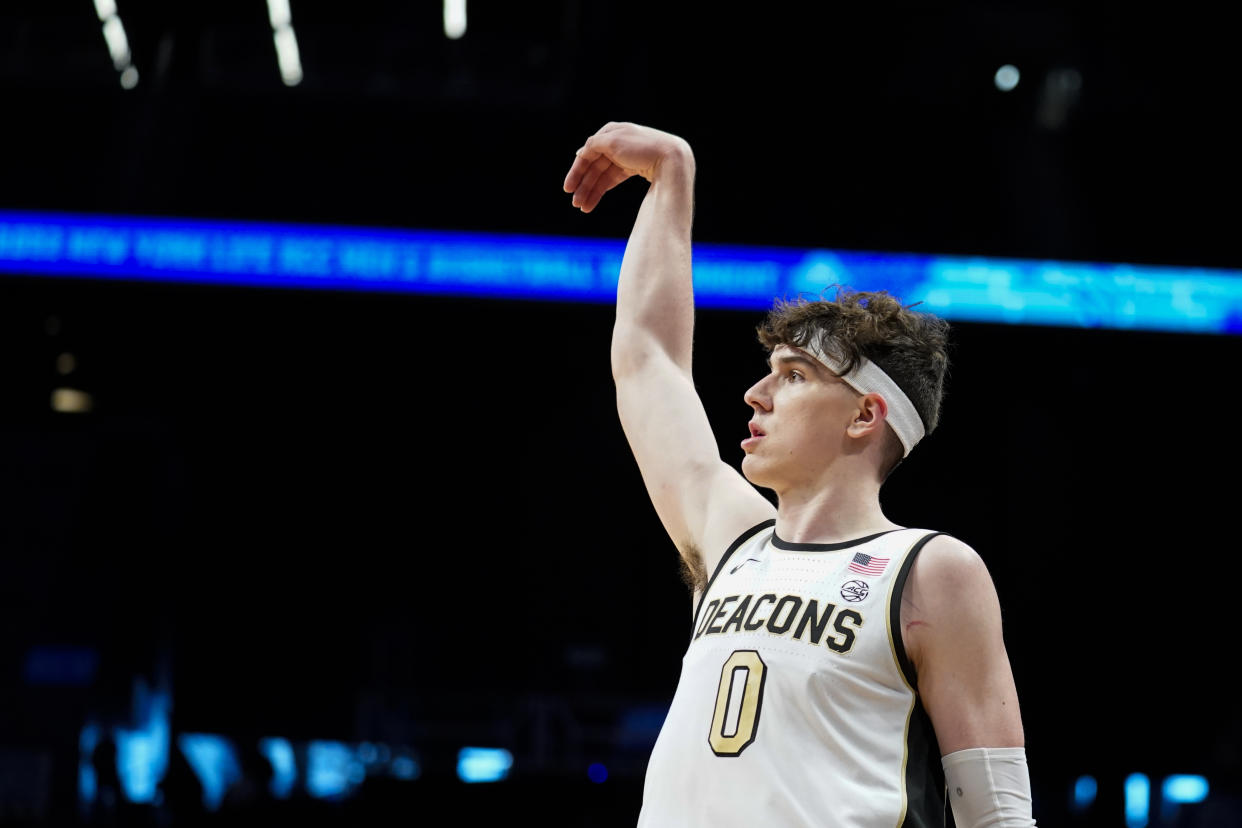 Wake Forest's Jake LaRavia (0) watches his three point shot in the first half of an NCAA college basketball game against Boston College during the Atlantic Coast Conference men's tournament, Wednesday, March 9, 2022, in New York. (AP Photo/John Minchillo)