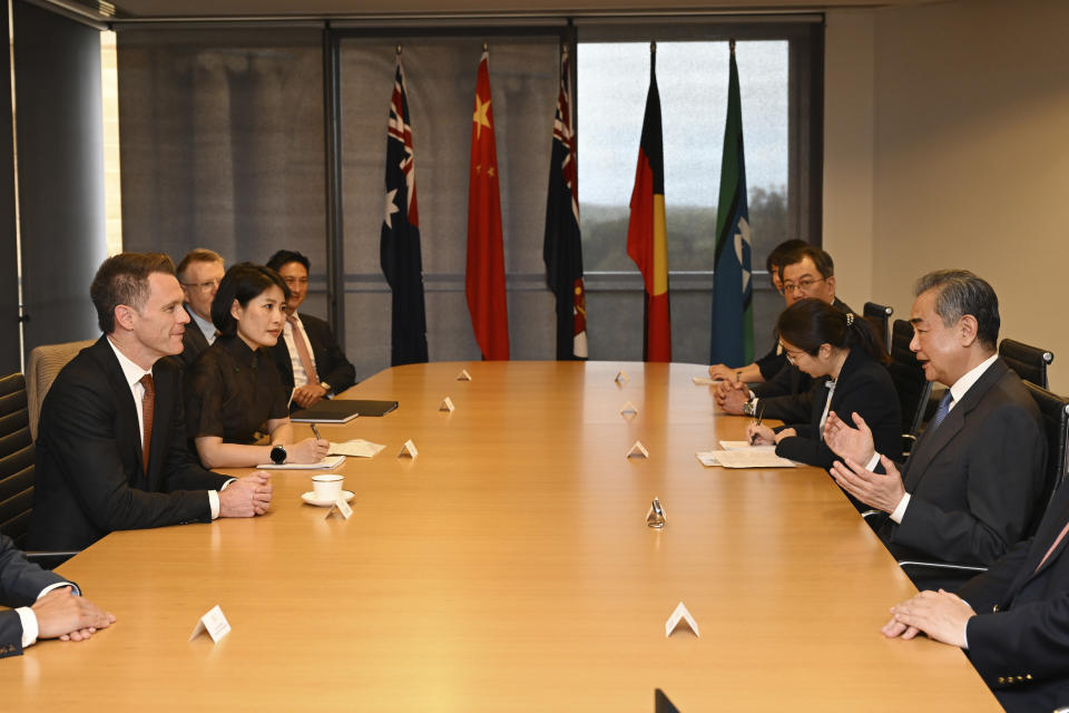 Chinese Foreign Minister Wang Yi, right, meets with New South Wales state Premier Chris Minns, left. during a visit to New South Wales Parliament House in Sydney, Thursday, March 21, 2024. Australia received its most senior Chinese leadership visit in nearly seven years with Wang's arrival Wednesday. (Dean Lewins/Pool Photo via AP)