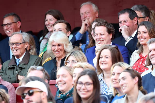 <p>Chris Jackson/Getty</p> Queen Camilla (center left) and Tom Parker Bowles (center right) at the Queen's Reading Room Literary Festival at Hampton Court Palace on June 8, 2024.