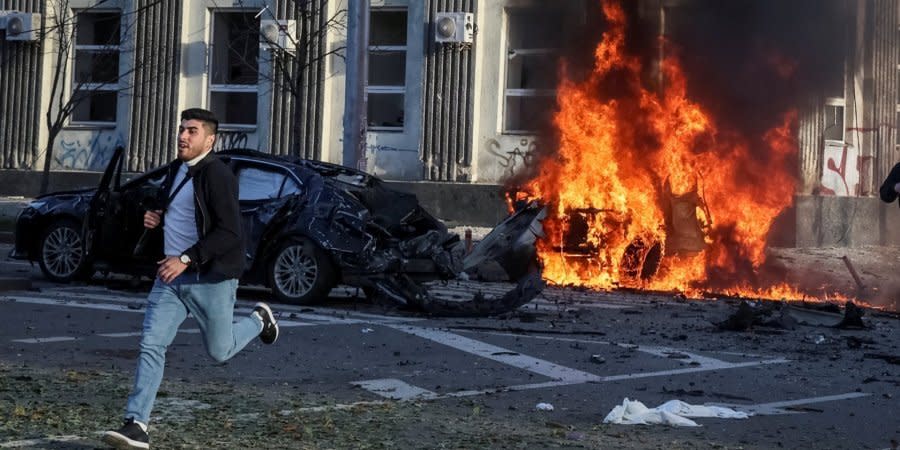 A burning car in the center of Kyiv after a Russian missile strike