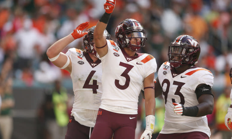 Virginia Tech star Caleb Farley, a top college football NFL Draft prospect, celebrates a play vs. Miami.